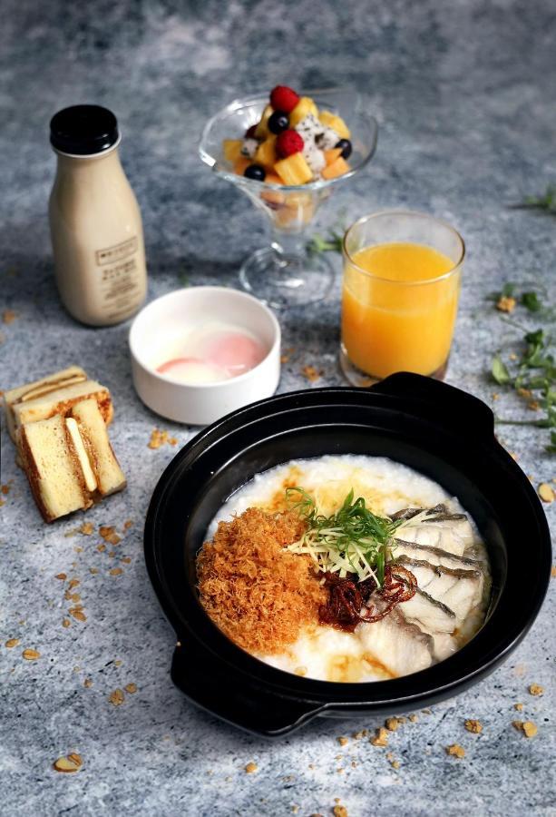 Oasia Resort Sentosa By Far East Hospitality Сингапур Экстерьер фото A bowl of congee with preserved meat and egg