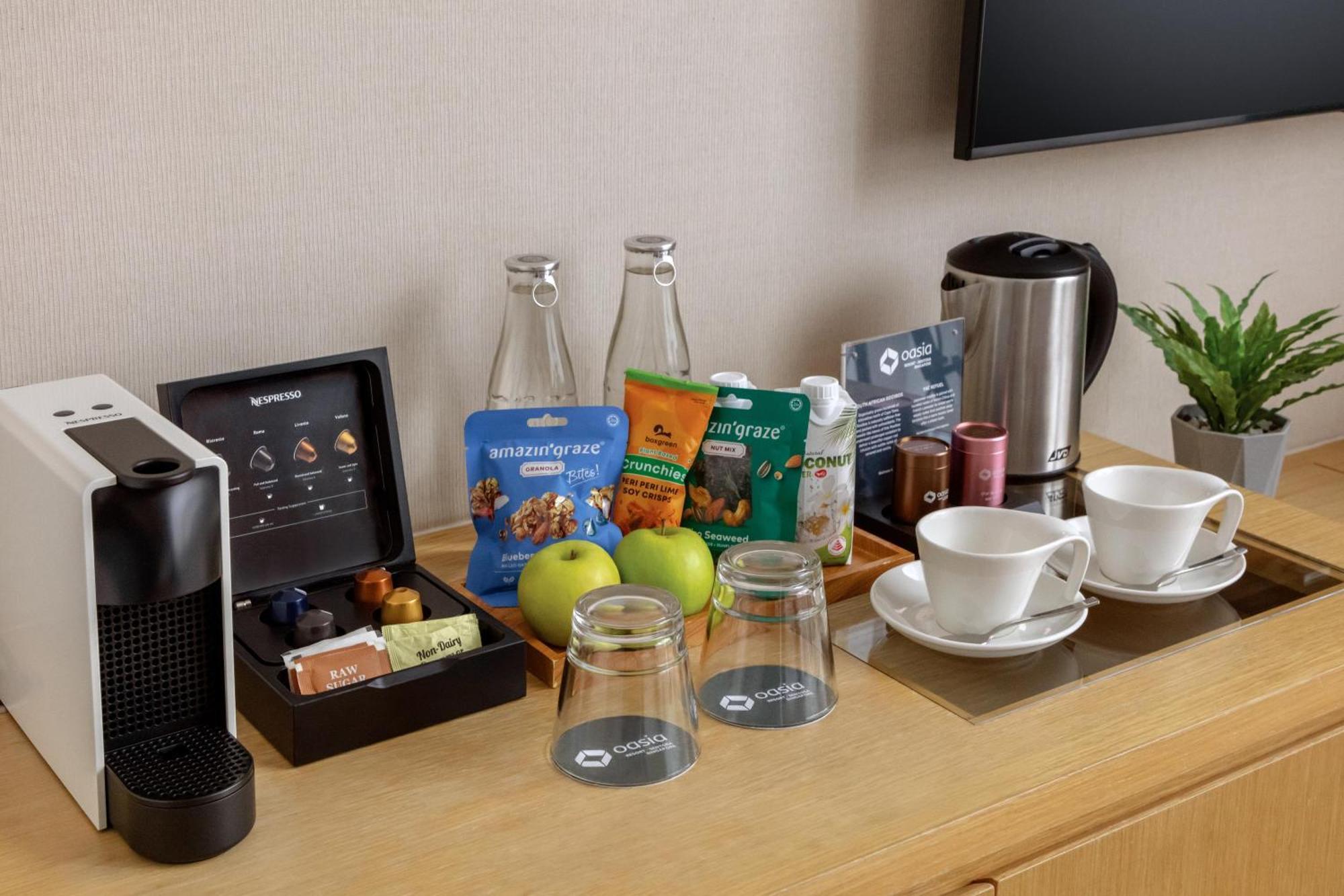 Oasia Resort Sentosa By Far East Hospitality Сингапур Экстерьер фото A Nespresso coffee machine in a hotel room